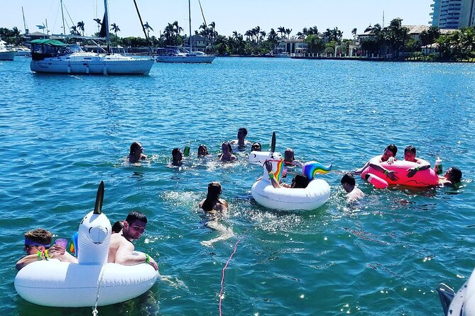 Family Friendly Boat Cruise and Swim - Stop 2: downtown cruise, Yacht Club views, and sunset timing
