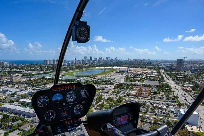 Helicopter Tour-Miami Iconic Coast and City Views - Miami Beach area: luxury buildings, celebrity houses, and ocean wildlife